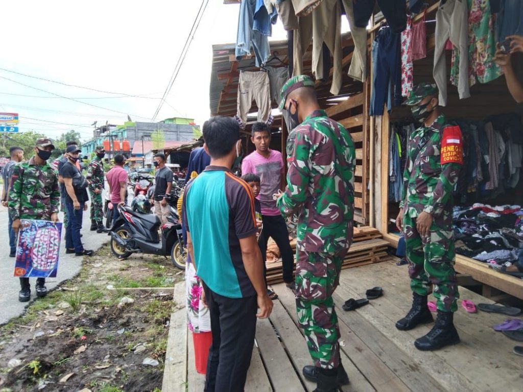 Prajurit TNI Yonif 642 Terapkan Prokes dan Kampanye Pencegahan Covid-19 13