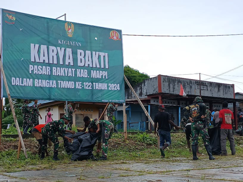 IMG-20241020-WA0035 Satgas TMMD Ke-122 Kodim Mappi Bersihkan Pasar 1